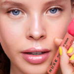 woman close-up nuxe plumping gloss