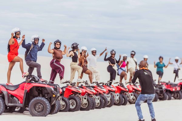 People on quad bikes riding on the Atlantis Dunes
