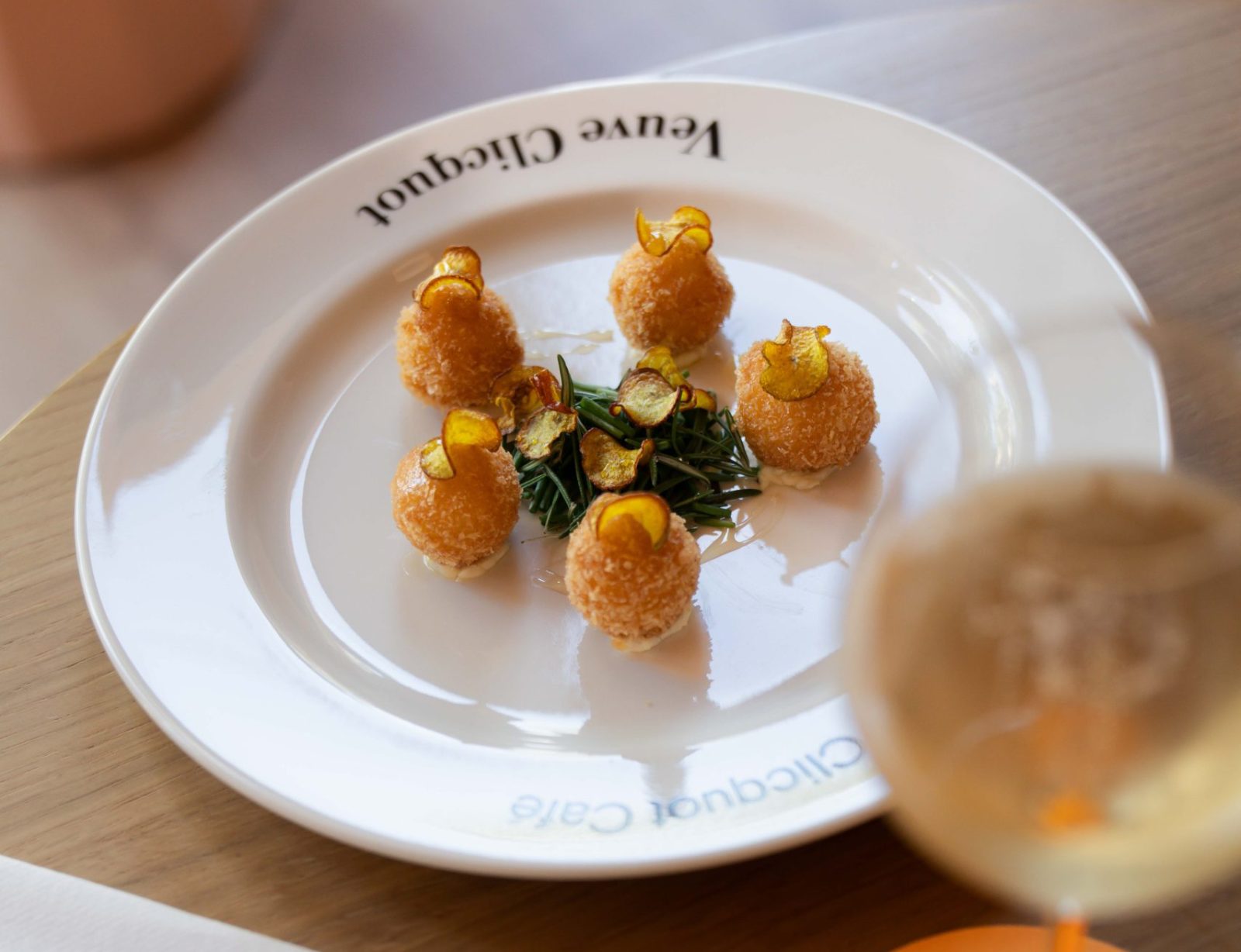 Veuve Clicquot’s Sun on Your Plate Café pairs art, food, and champagne at the Emotions of the Sun exhibition in Cape Town.