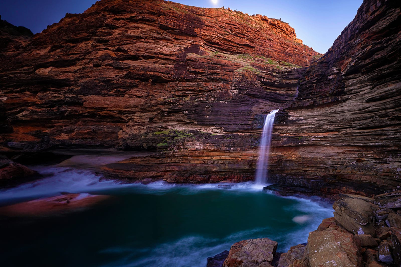 Explore six unforgettable Wild Coast experiences, from waterfalls into the ocean to the Sardine Run and slow living in Port St Johns.