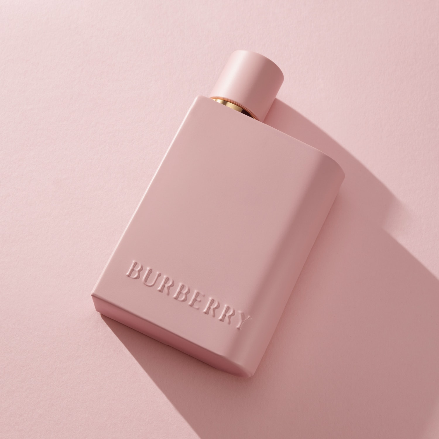 Explore Burberry Her perfume, featuring Olivia Dean, perfumer Aurelien Guichard and a bold pink bottle design rooted in heritage luxury.
