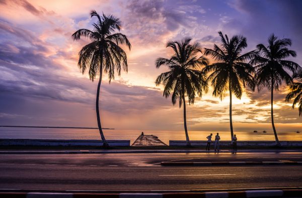 Discover Gabon through Libreville’s Atlantic coast and Lambaréné’s rainforest river life. A two-stop journey into history and nature.