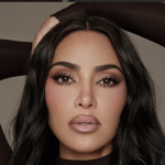 Kim Kardashian and Lewis Hamilton were seen kissing during a Malibu beach outing, sparking fresh attention around their relationship.
