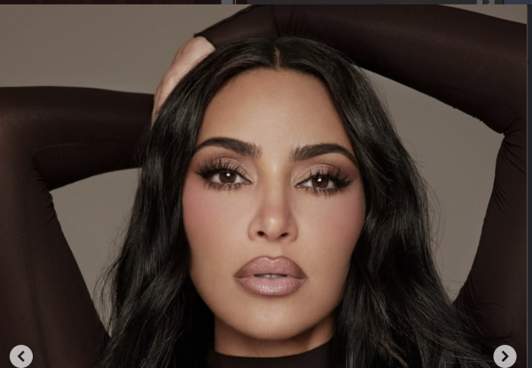 Kim Kardashian and Lewis Hamilton were seen kissing during a Malibu beach outing, sparking fresh attention around their relationship.
