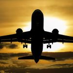 A Qantas flight from Melbourne to Dallas was diverted to Tahiti after a passenger allegedly bit a crew member during a violent outburst.