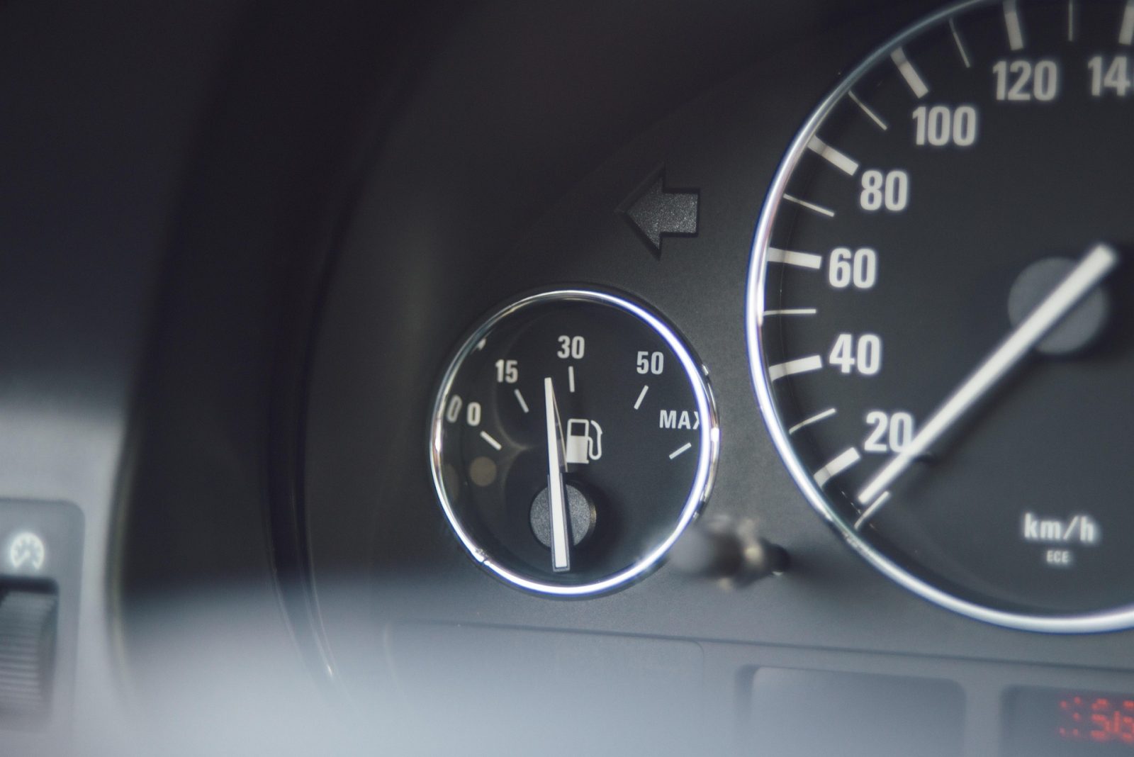 Fuel nozzle at a petrol station following the official July 2026 fuel price decrease.