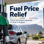 Fuel pump at a South African petrol station with a price board showing petrol and diesel decreases.
