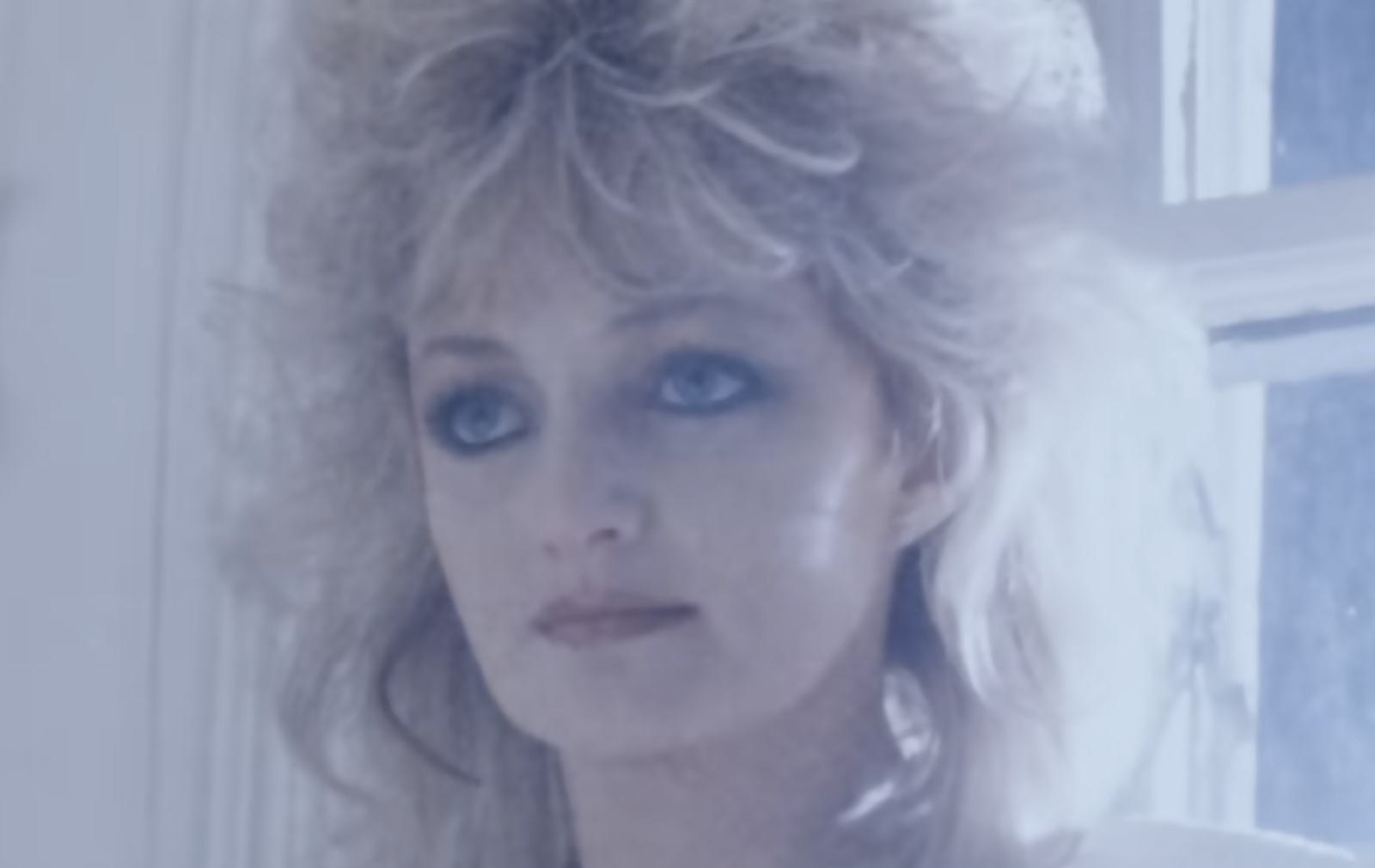 Welsh rock singer Bonnie Tyler performing on stage.
