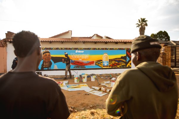A Tropika-branded taxi and colourful mural inspired by the artistic style of Dr Esther Mahlangu.