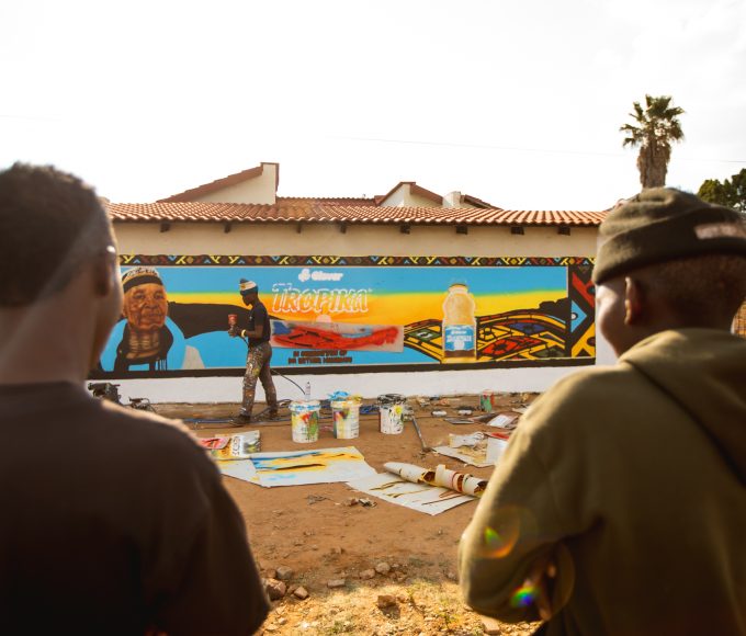 A Tropika-branded taxi and colourful mural inspired by the artistic style of Dr Esther Mahlangu.