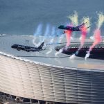 Two Airlink passenger jets flying in formation above DHL Stadium in Cape Town