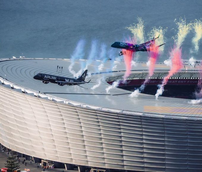 Two Airlink passenger jets flying in formation above DHL Stadium in Cape Town