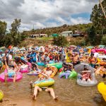 Music fans attending Up The Creek Festival beside the Breede River