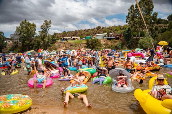 Music fans attending Up The Creek Festival beside the Breede River
