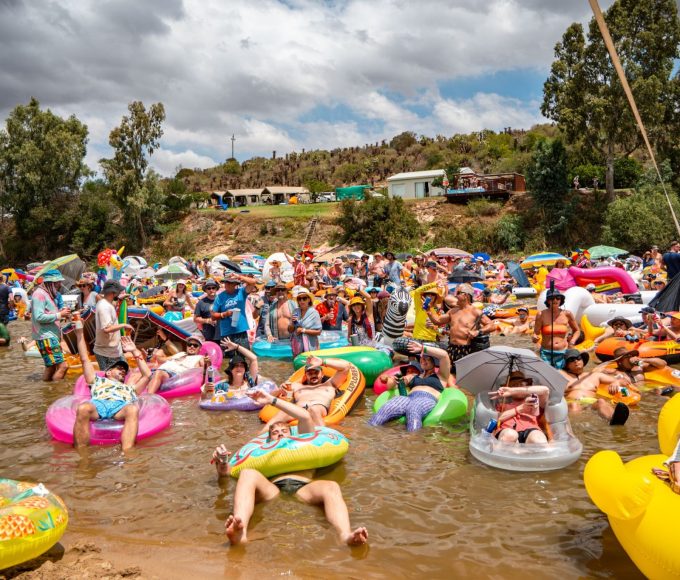 Music fans attending Up The Creek Festival beside the Breede River