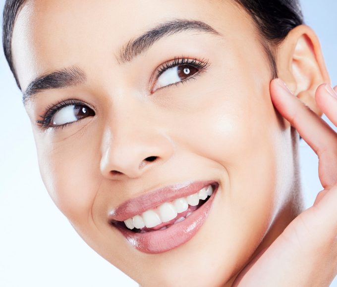 Skincare products including serums and moisturisers arranged for a daily skincare routine