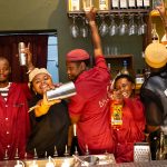 Bartenders preparing cocktails at the AJABU Cocktail & Spirits Festival in Cape Town