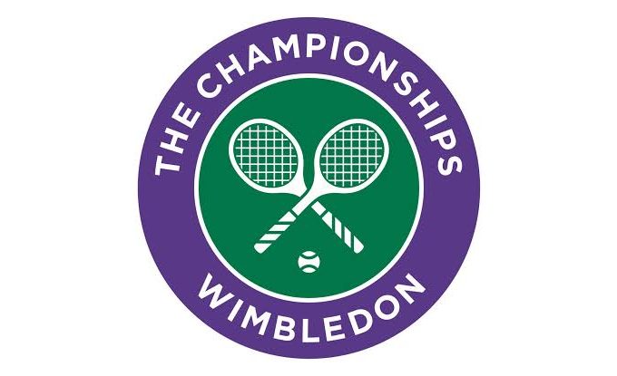 Spectators watching a tennis match at Wimbledon