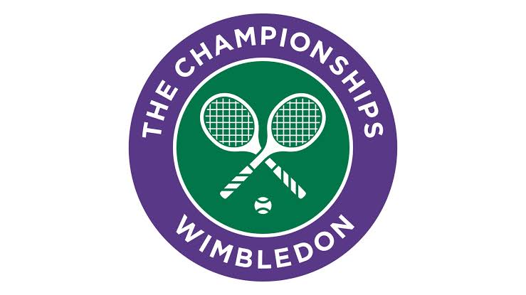 Spectators watching a tennis match at Wimbledon